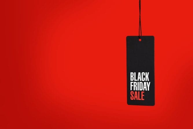 Black,Friday.,Sale,Tag,On,The,Red,Background